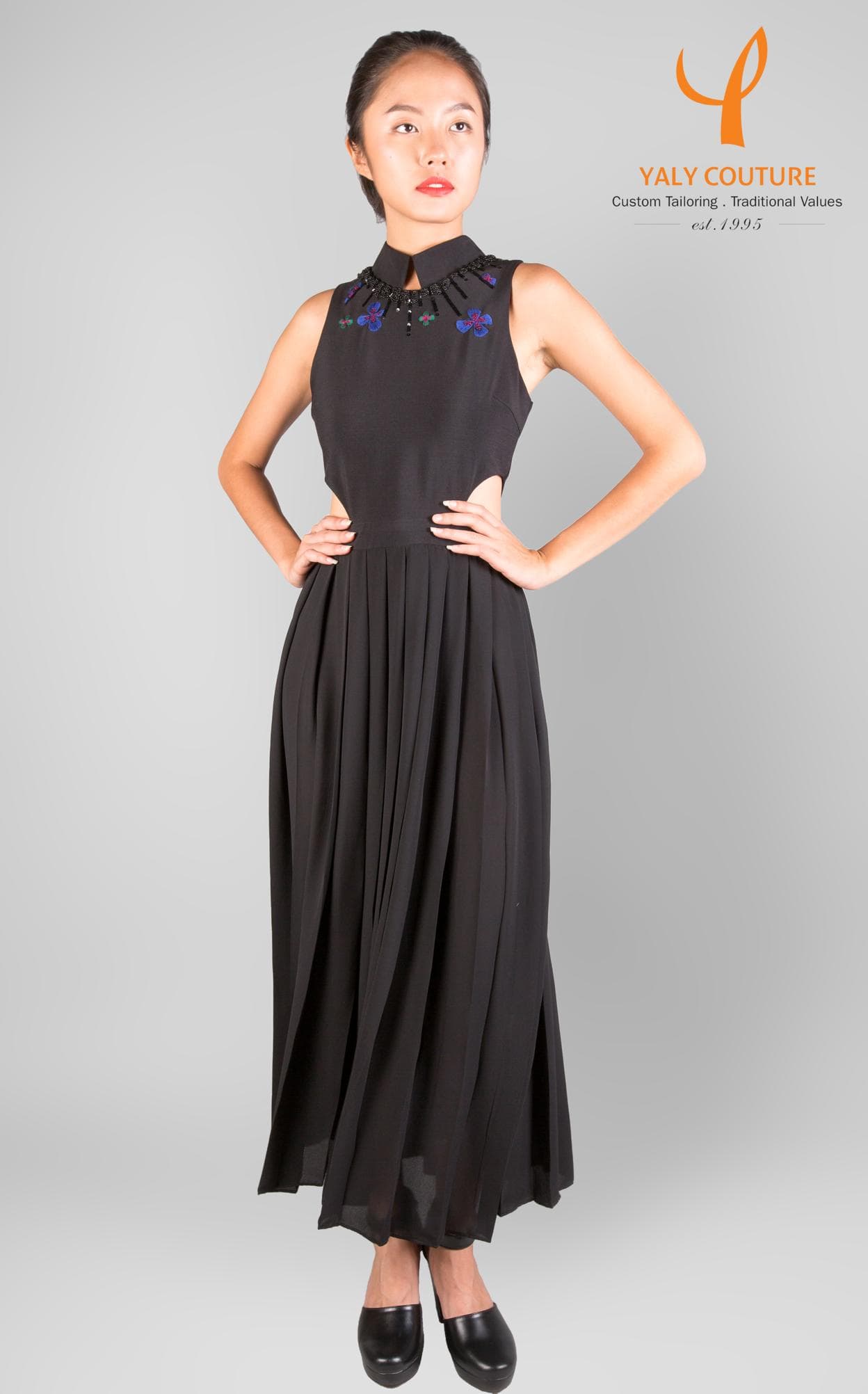 CUT-OUT BLACK DRESS WITH BEADED PATTERN