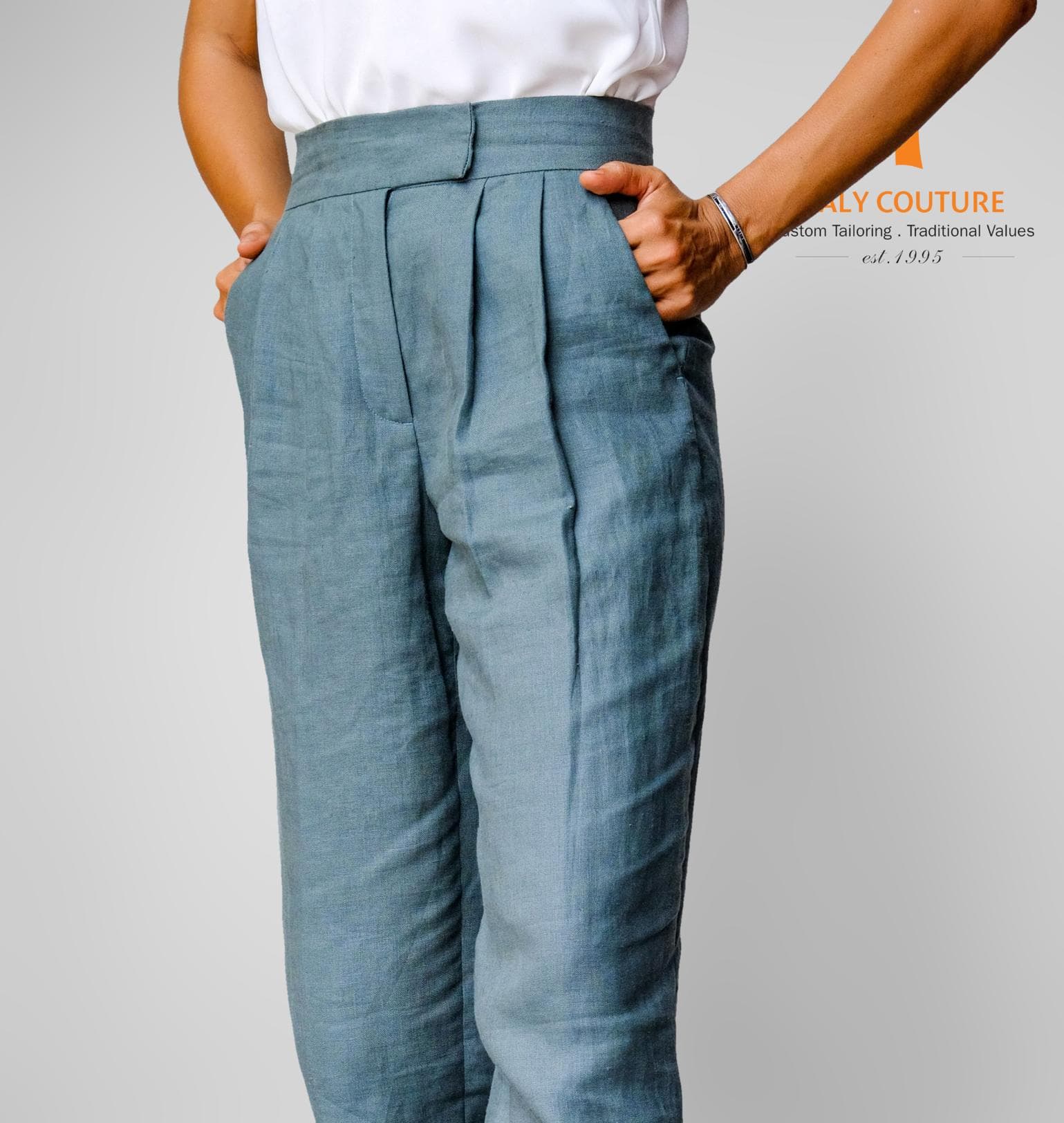 GREEN LINEN PLEATED TROUSERS