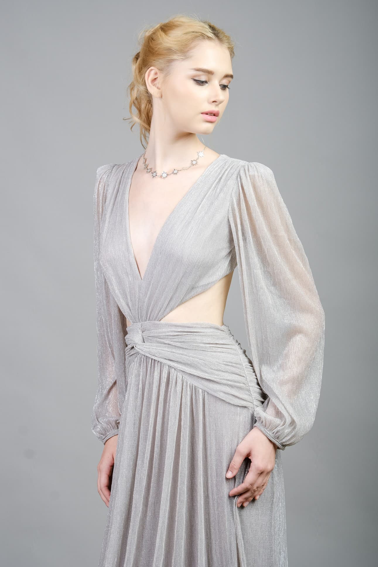 METALLIC EVENING DRESS WITH A TWIST